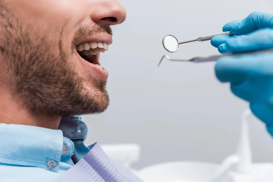 dentist weddington nc performing dental exam