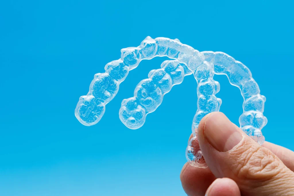 dentist-holding-invisalign-charlotte
