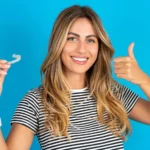woman-about-to-wear-her-invisalign-charlotte